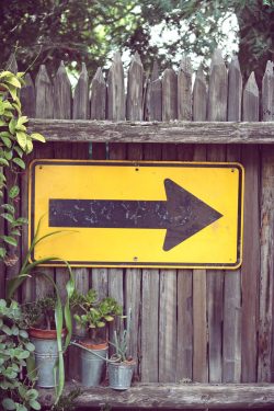 yellow arrow signage